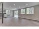 Spacious living room featuring recessed lighting, hardwood floors, and sliding glass doors to the outdoors at 1301 Stafford Rd, Plainfield, IN 46168