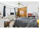 Comfortable bedroom with natural light, ample closet space, and neutral decor at 1408 W Jackson St, Muncie, IN 47303