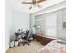 Well-lit bedroom with desk area, built-in storage, and large window for natural light at 1408 W Jackson St, Muncie, IN 47303