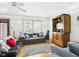 Comfortable living room with hardwood floors, neutral tones, and abundant natural light at 1408 W Jackson St, Muncie, IN 47303