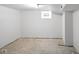 Spacious unfinished basement with concrete flooring and white walls at 1417 E Michigan St, Indianapolis, IN 46201