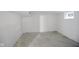 Spacious unfinished basement with concrete flooring and white walls at 1417 E Michigan St, Indianapolis, IN 46201
