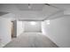 Open basement with white walls, perfect for storage or future renovation projects at 1417 E Michigan St, Indianapolis, IN 46201