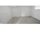Spacious unfinished basement with concrete flooring and white walls at 1417 E Michigan St, Indianapolis, IN 46201