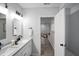 Well-lit bathroom leads to bonus seating area at 1417 E Michigan St, Indianapolis, IN 46201