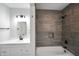 Modern bathroom with a tiled shower and tub, and a white vanity at 1417 E Michigan St, Indianapolis, IN 46201