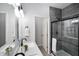 Stylish bathroom with a double sink vanity, modern fixtures, and a glass shower for a spa-like retreat at 1417 E Michigan St, Indianapolis, IN 46201