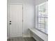 Mudroom with a window seat and natural light at 1417 E Michigan St, Indianapolis, IN 46201