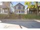 Attractive two-story home featuring well-kept landscaping and a classic architectural design at 1417 E Michigan St, Indianapolis, IN 46201