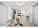 Open-concept living area with fireplace, stairs, and an inviting layout perfect for Gathering gatherings at 1417 E Michigan St, Indianapolis, IN 46201