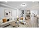 Inviting living room with a fireplace, neutral tones, and modern decor for cozy relaxation at 1417 E Michigan St, Indianapolis, IN 46201