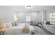 The main bedroom is full of natural light from two windows at 1417 E Michigan St, Indianapolis, IN 46201