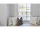 Inviting window seat features decorative pillows and natural light at 1417 E Michigan St, Indianapolis, IN 46201