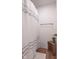 Cozy bathroom showcasing a patterned shower curtain and decorative wooden crate with flowers at 1417 Layton Rd, Anderson, IN 46011