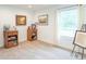 A bedroom with two dark wood bookcases and a bright window at 1417 Layton Rd, Anderson, IN 46011