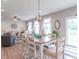 Dining room with table, six chairs, and access to outdoor patio at 1417 Layton Rd, Anderson, IN 46011