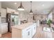 Open kitchen with stainless steel appliances and a large center island at 1417 Layton Rd, Anderson, IN 46011
