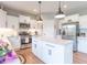 Stylish kitchen with stainless appliances, white cabinets, and granite countertops at 1417 Layton Rd, Anderson, IN 46011