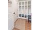 Well-organized mudroom with custom shelving, a coat rack and a convenient bench at 1417 Layton Rd, Anderson, IN 46011
