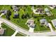 Aerial view of a well-maintained home with a beautiful lawn and convenient street access at 1426 Manchester Dr, Danville, IN 46122