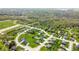Aerial view captures the community's harmonious integration with green spaces and recreational amenities at 1426 Manchester Dr, Danville, IN 46122