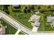 Aerial view of a lovely home featuring a well-maintained yard and appealing landscaping at 1426 Manchester Dr, Danville, IN 46122