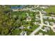 An aerial view showcases the neighborhood's blend of green spaces and residential areas at 1426 Manchester Dr, Danville, IN 46122