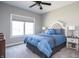 Comfortable bedroom with a queen-sized bed, plush bedding, and plenty of natural light at 1426 Manchester Dr, Danville, IN 46122
