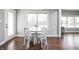 Eat-in kitchen features a round table and window with a backyard view at 1426 Manchester Dr, Danville, IN 46122