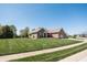 Beautifully landscaped brick home with a two-car garage in a quiet neighborhood at 1426 Manchester Dr, Danville, IN 46122