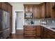 Kitchen with stainless steel appliances, tile backsplash, and granite counters at 1426 Manchester Dr, Danville, IN 46122