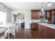 Open floor plan offers a seamless view of the eat-in-kitchen and living room at 1426 Manchester Dr, Danville, IN 46122