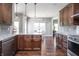Bright open kitchen with a dining area and view of another living space at 1426 Manchester Dr, Danville, IN 46122