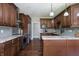 Spacious kitchen features stainless steel appliances, granite counters, and sleek backsplash at 1426 Manchester Dr, Danville, IN 46122