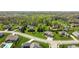 A peaceful suburban neighborhood with lush greenery, well-kept homes, and tree coverage at 1426 Manchester Dr, Danville, IN 46122