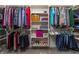 Organized walk-in closet with custom shelving, hanging rods, and storage solutions at 1426 Manchester Dr, Danville, IN 46122