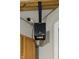 Close-up view of the 'Dyna-Glo' air purifier mounted on the ceiling, promoting clean indoor air quality at 15 Northridge Ct, Brownsburg, IN 46112