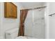 Bright bathroom features a glass-enclosed shower with colorful shower curtain at 15 Northridge Ct, Brownsburg, IN 46112
