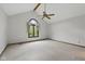 Spacious bedroom featuring neutral carpet, ceiling fan, and vaulted ceiling at 15 Northridge Ct, Brownsburg, IN 46112