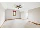 Bright bedroom featuring neutral walls, carpet flooring and a ceiling fan at 15 Northridge Ct, Brownsburg, IN 46112