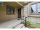 Charming front entry with stone accents, tidy landscaping, and a black handrail at 15 Northridge Ct, Brownsburg, IN 46112