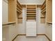 Walk-in closet with built-in shelving and drawers for optimal storage at 15 Northridge Ct, Brownsburg, IN 46112