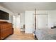 Bright bedroom featuring wood floors, closet, and decorative chair at 155 Suncrest Dr, Greenwood, IN 46143