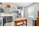 Charming kitchen featuring stainless steel appliances and ample counter space at 155 Suncrest Dr, Greenwood, IN 46143