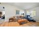 Inviting living room with wood floors, a large window, and cozy furnishings at 155 Suncrest Dr, Greenwood, IN 46143