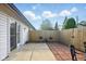 Private patio with brick pavers and patio area perfect for outdoor dining and entertaining at 155 Suncrest Dr, Greenwood, IN 46143
