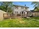 Spacious back yard with a large wooden deck and lush green grass at 17 W Washington St, Mooresville, IN 46158
