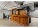 Basement bar area featuring wooden bar and walls at 17 W Washington St, Mooresville, IN 46158