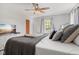 Cozy bedroom featuring neutral colors, natural light, and a comfortable king-size bed for relaxing evenings at 17 W Washington St, Mooresville, IN 46158