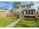 Charming home featuring a large rear deck, well-maintained lawn, and classic architecture perfect for entertaining and relaxation at 17 W Washington St, Mooresville, IN 46158